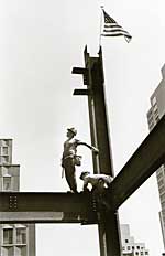 steelworkers on steel beams